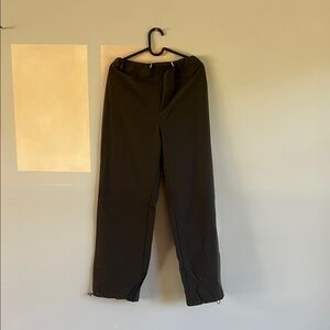 Typha warmup pants in dark green